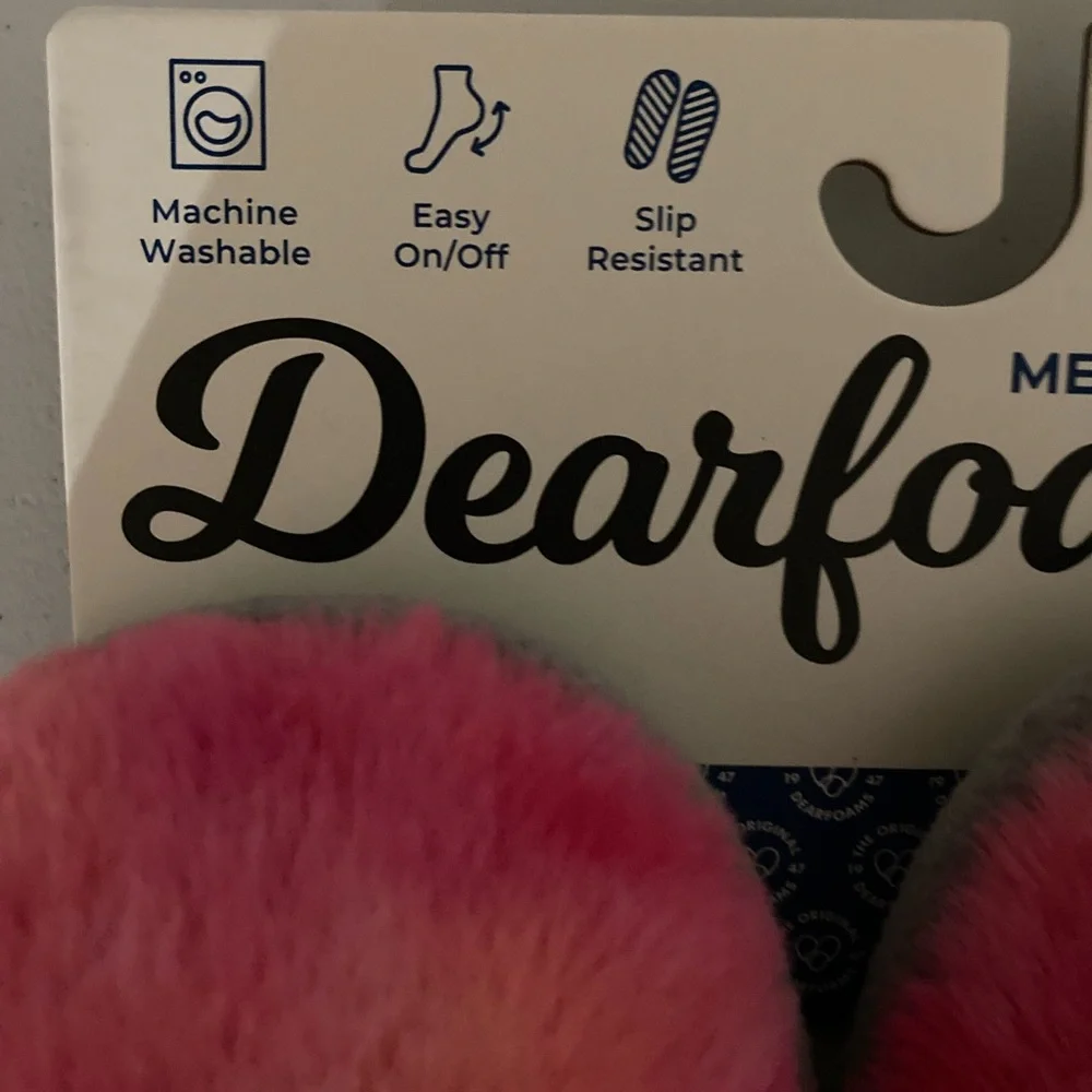 Pink fuzzy unicorn slippers by Dearfoams